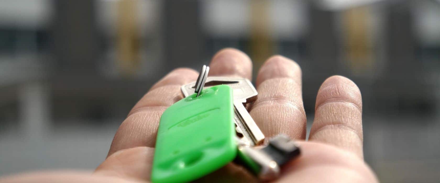 person holding keys