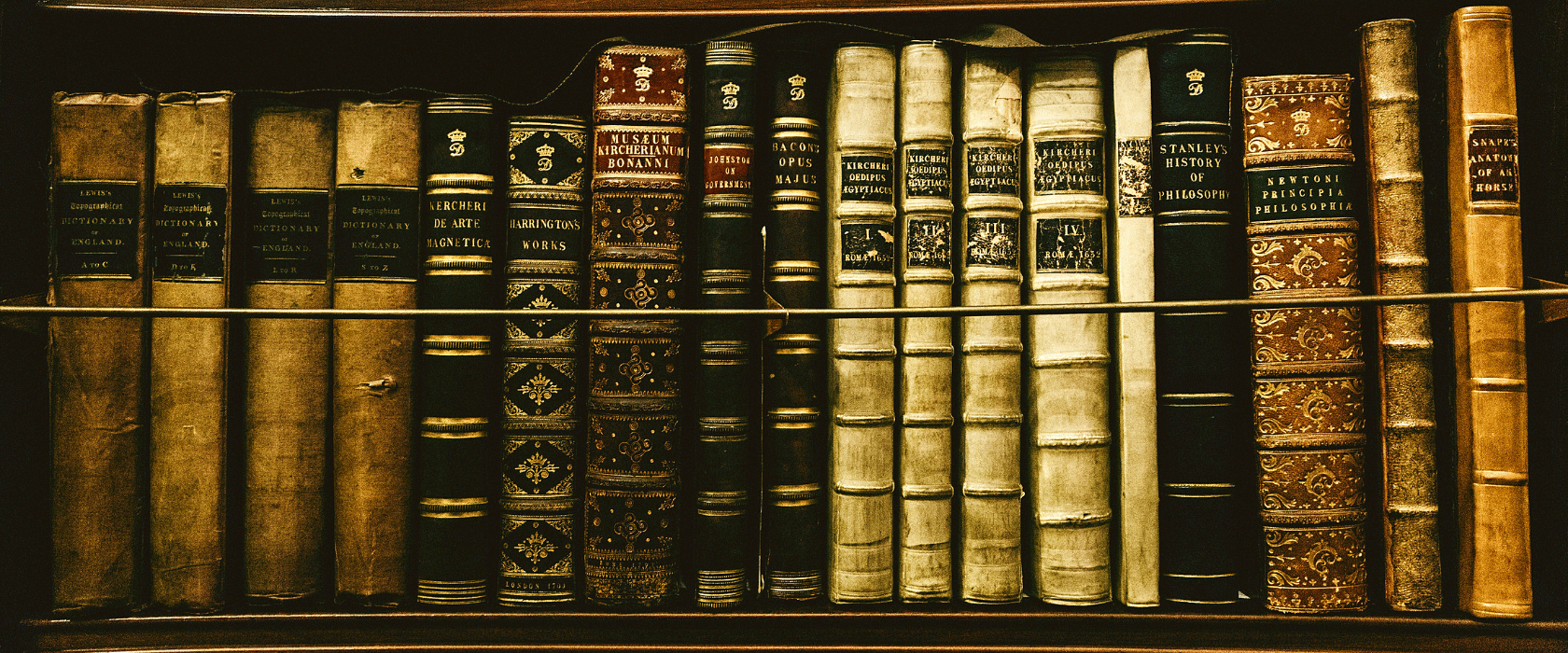 a bookshelf with old books